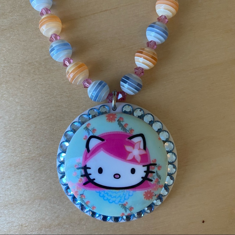 tarina tarantino hello kitty pink head necklace